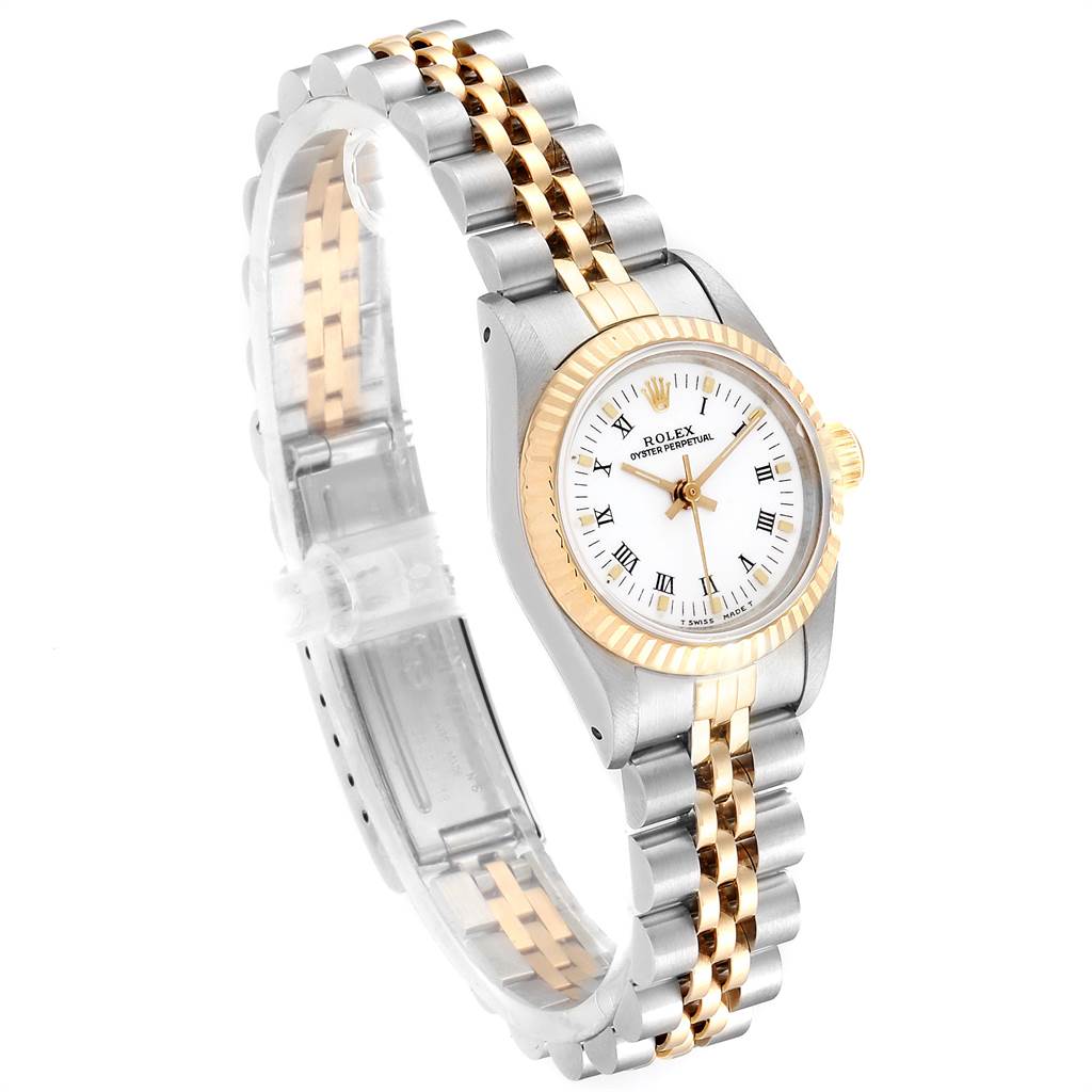 The Rolex Oyster Perpetual 67193 Women's Steel and Gold (two tone) White Dial 67193 Women's Steel and Gold (two tone) White Dial watch is shown at a slight angle, highlighting the two-tone bracelet, silver case, and white dial with Roman numerals.