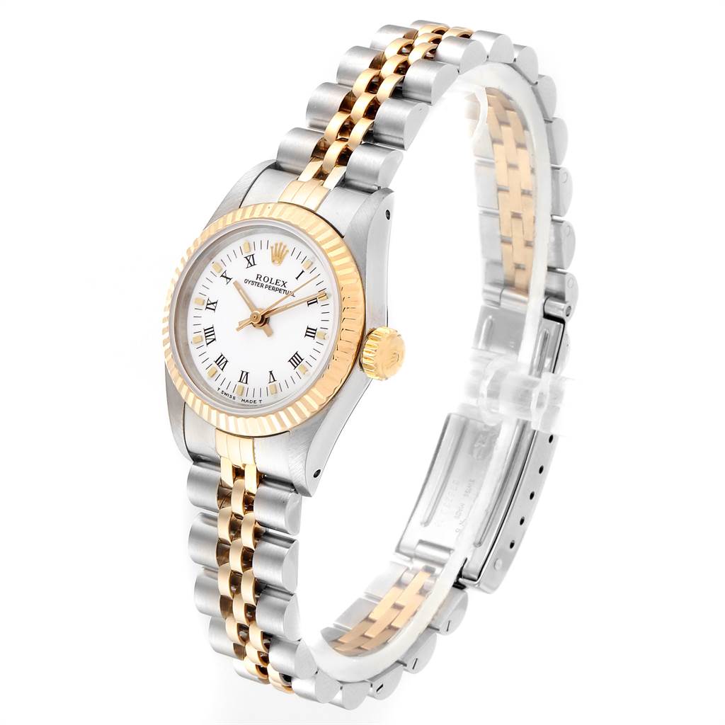 The Rolex Oyster Perpetual 67193 Women's Steel and Gold (two tone) White Dial 67193 Women's Steel and Gold (two tone) White Dial watch is shown at an angle displaying the dial, crown, and two-tone bracelet.