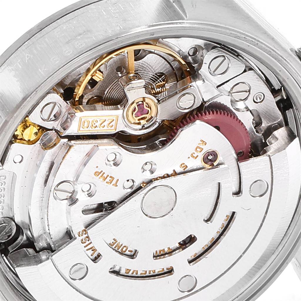 This image shows a close-up view of the internal mechanical movement of a Rolex Oyster Perpetual 76094 Women's Stainless Steel Black Dial 76094 Women's Stainless Steel Black Dial watch.