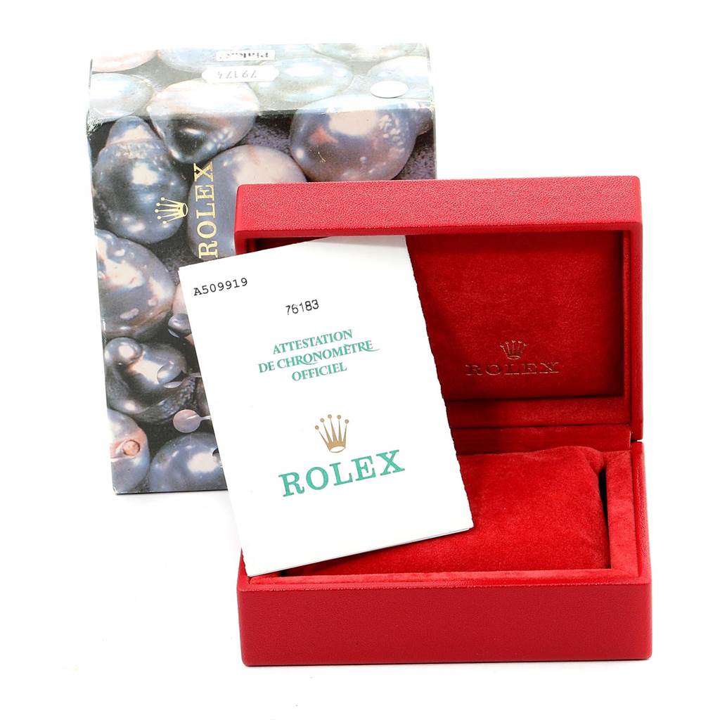 The image shows the packaging and certification for a Rolex Oyster Perpetual 76183 Women's Steel and Gold (two tone) Champagne Dial 76183 Women's Steel and Gold (two tone) Champagne Dial model, including the outer box, inner red case, and official paperwork.