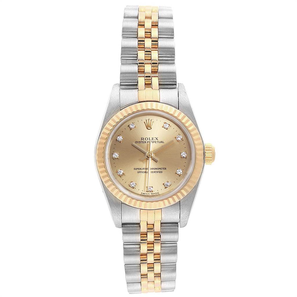 This image shows a Rolex Oyster Perpetual 67193 Women's Steel and Gold (two tone) Champagne Dial 67193 Women's Steel and Gold (two tone) Champagne Dial watch from a top-down view, featuring its dial, bezel, crown, and Jubilee bracelet.