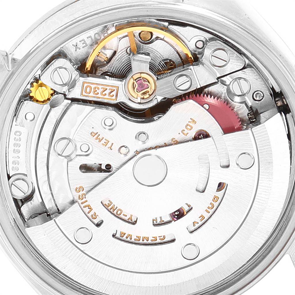 This image shows the internal movement mechanism of a Rolex Oyster Perpetual 76183 Women
s Steel and Gold (two tone) Champagne Dial 76183 Women
s Steel and Gold (two tone) Champagne Dial watch from a top-down angle.