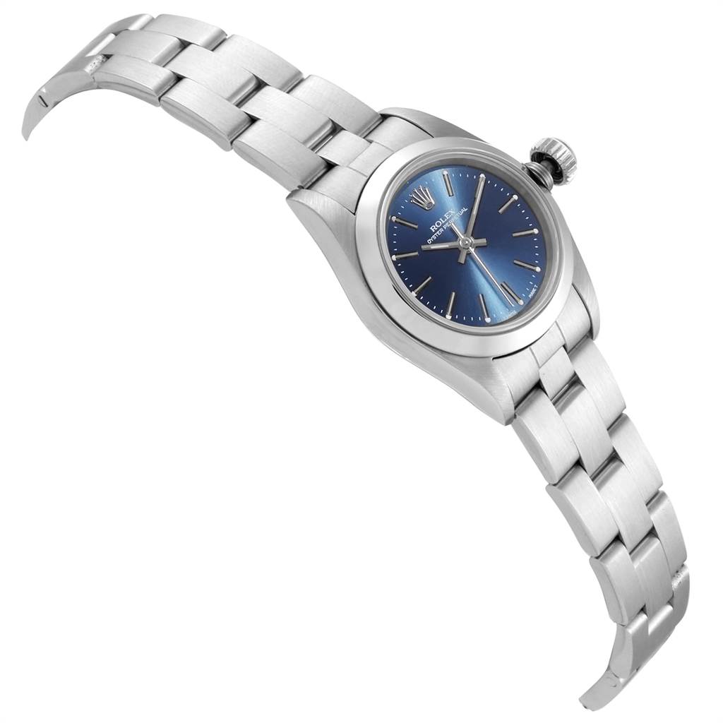 This image shows a side angle of a Rolex Oyster Perpetual 67180 Women's Stainless Steel Blue Dial 67180 Women's Stainless Steel Blue Dial, displaying the bracelet, case, dial, and crown.