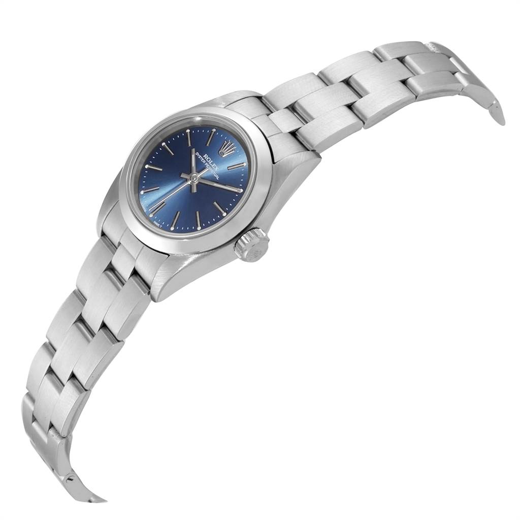 This image shows a Rolex Oyster Perpetual 67180 Women's Stainless Steel Blue Dial 67180 Women's Stainless Steel Blue Dial watch angled from the side, displaying the bracelet, case, crown, and blue dial.