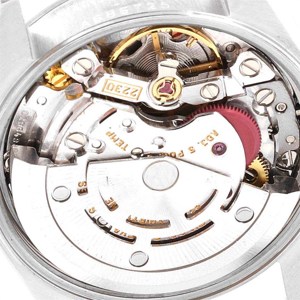 This image shows the inside mechanism and movement parts of a Rolex Oyster Perpetual 76080 Women's Stainless Steel Pink Dial 76080 Women's Stainless Steel Pink Dial watch.
