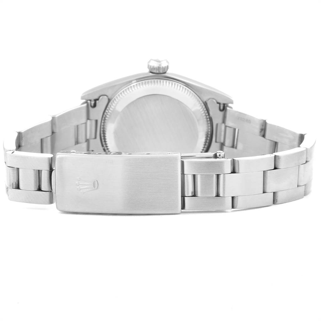 The image shows the back view of a Rolex Oyster Perpetual 76094 Women's Stainless Steel Black Dial 76094 Women's Stainless Steel Black Dial watch, focusing on the clasp, bracelet, and case back.