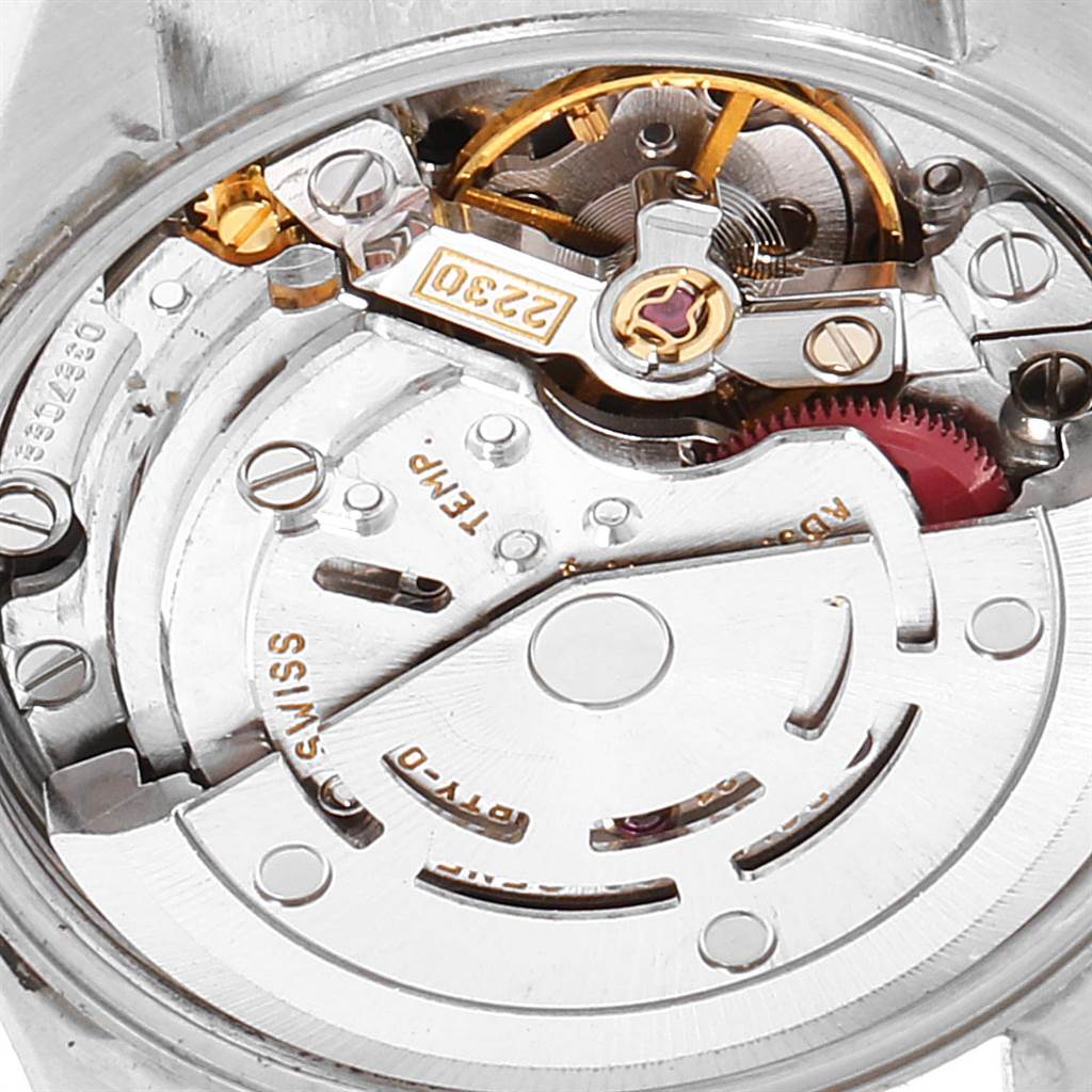 This image shows the intricate internal mechanism and components of a Rolex Oyster Perpetual 76080 Women's Stainless Steel Black Dial 76080 Women's Stainless Steel Black Dial watch from a top-down angle.