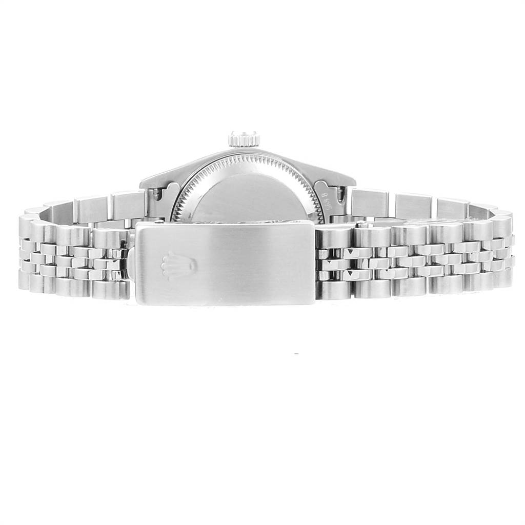 The image shows a rear view of a Rolex Oyster Perpetual 76080 Women's Stainless Steel Black Dial 76080 Women's Stainless Steel Black Dial watch, highlighting the clasp and part of the bracelet.