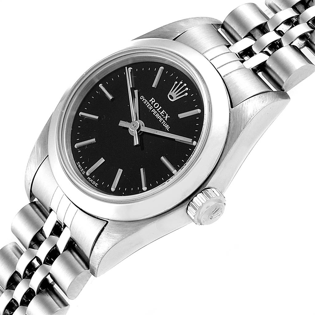 The Rolex Oyster Perpetual 76080 Women's Stainless Steel Black Dial 76080 Women's Stainless Steel Black Dial watch is shown at an angled view, displaying the face, bezel, crown, and part of the bracelet.