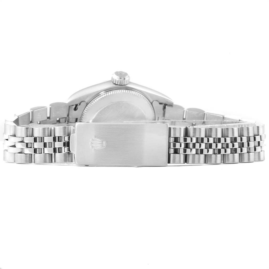 The image shows the back view of a Rolex Oyster Perpetual 67194 Women's Stainless Steel Silver Dial 67194 Women's Stainless Steel Silver Dial watch, highlighting its bracelet and clasp.