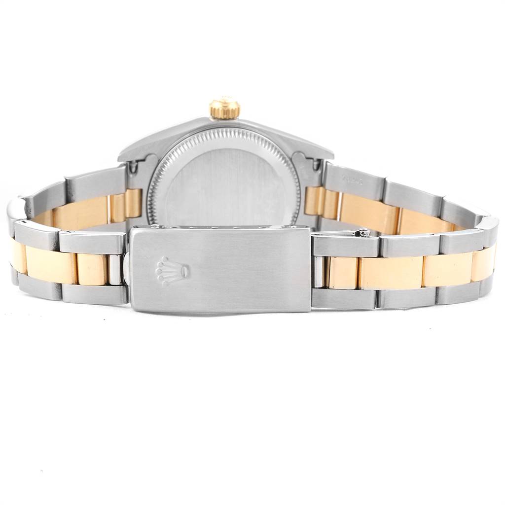 The image shows the back view of a Rolex Oyster Perpetual 76193 Women's Steel and Gold (two tone) Silver Dial 76193 Women's Steel and Gold (two tone) Silver Dial watch, highlighting its bracelet and clasp.