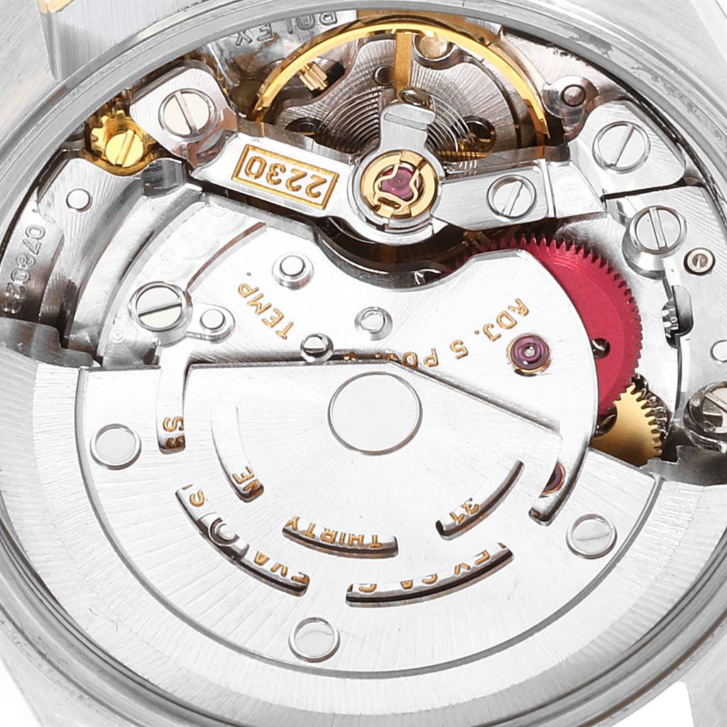 This image shows a close-up view of the movement inside an Oyster Perpetual model by Rolex.