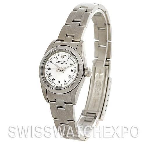 The Rolex Oyster Perpetual 76080 Women's Stainless Steel White Dial 76080 Women's Stainless Steel White Dial watch is shown at a slight angle, displaying its face, bracelet, and partially open clasp.