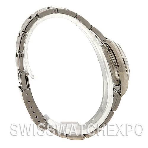 The image shows a side profile view of a Rolex Oyster Perpetual 76080 Women's Stainless Steel White Dial 76080 Women's Stainless Steel White Dial watch, focusing on the watch case, bezel, and bracelet.