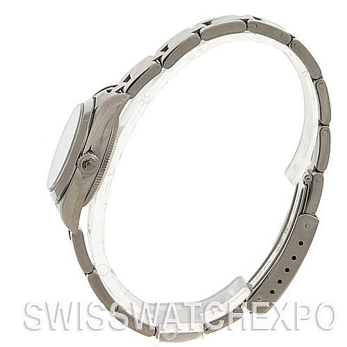 The image shows a Rolex Oyster Perpetual 76080 Women's Stainless Steel White Dial 76080 Women's Stainless Steel White Dial watch from a side angle, highlighting the profile of the case and bracelet.