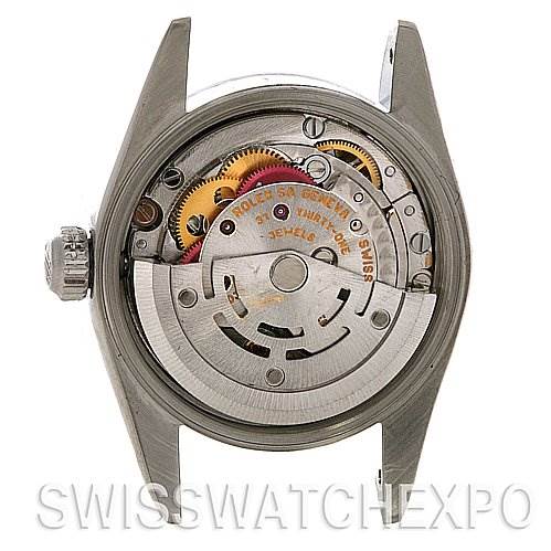 This image shows the back casing of a Rolex Oyster Perpetual 76080 Women's Stainless Steel White Dial 76080 Women's Stainless Steel White Dial watch, highlighting its internal movement mechanism parts.