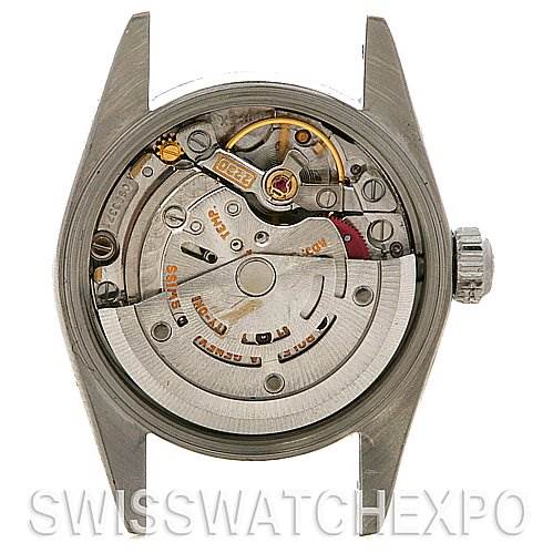 This image shows the internal mechanical movement of a Rolex Oyster Perpetual 76080 Women's Stainless Steel White Dial 76080 Women's Stainless Steel White Dial watch, viewed from the back with the case opened.