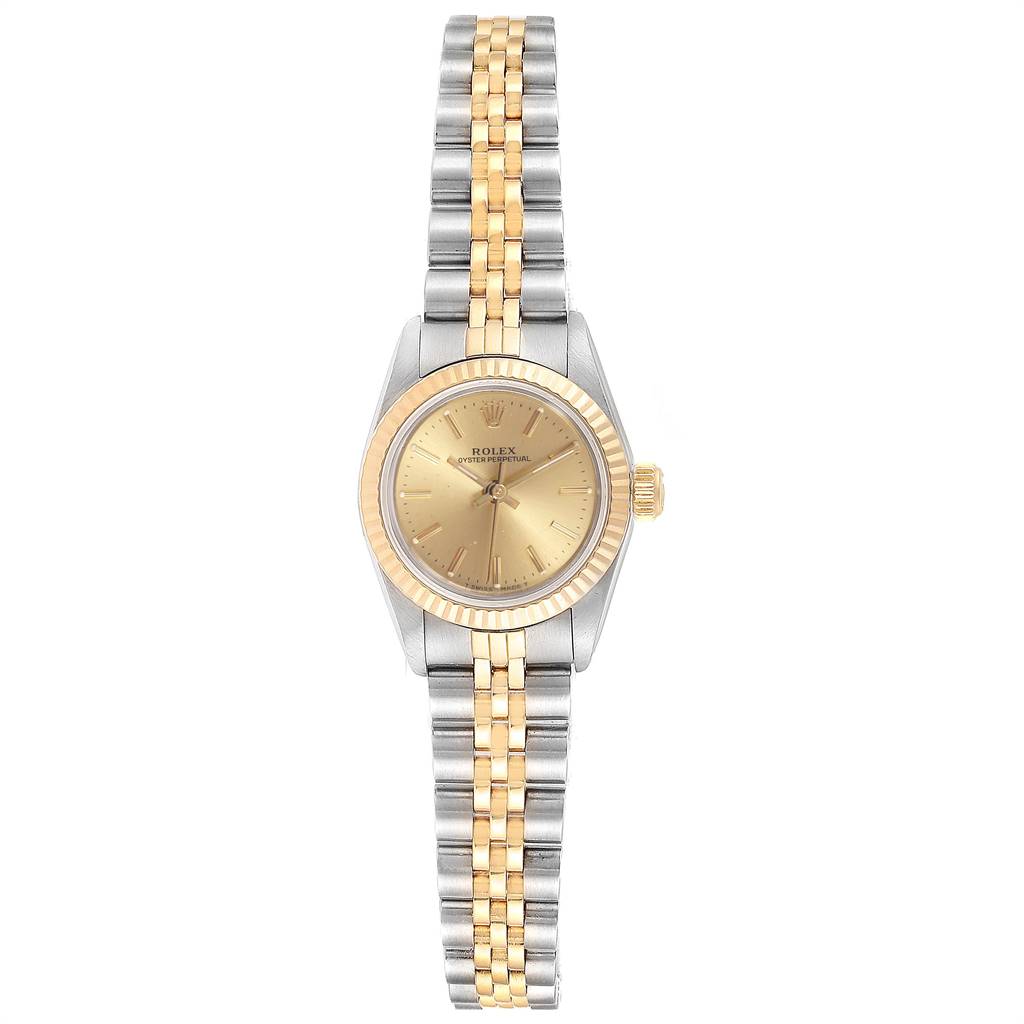 The image shows a top view of a Rolex Oyster Perpetual 67193 Women's Steel and Gold (two tone) Champagne Dial 67193 Women's Steel and Gold (two tone) Champagne Dial watch, highlighting its gold bezel and two-tone bracelet.