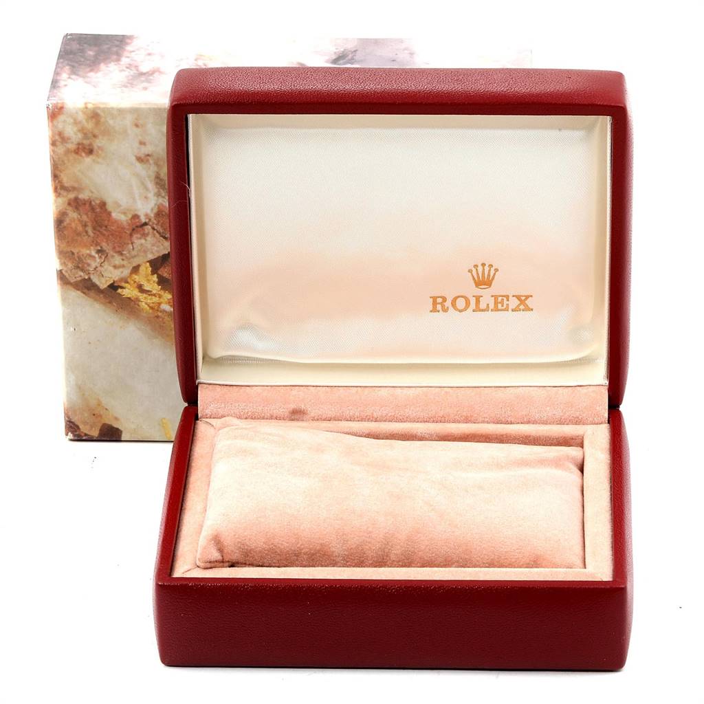 This image shows an empty Rolex Oyster Perpetual 69173 Women's Stainless Steel Champagne Dial 69173 Women's Stainless Steel Champagne Dial watch box from a front angle.