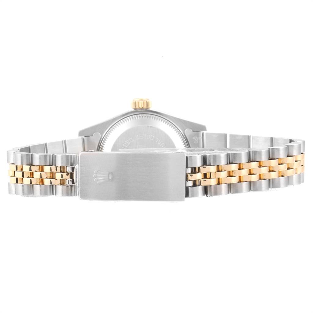 This image shows the back view of a Rolex Oyster Perpetual 69173 Women's Stainless Steel Champagne Dial 69173 Women's Stainless Steel Champagne Dial watch, focusing on the case back, crown, and two-tone bracelet.