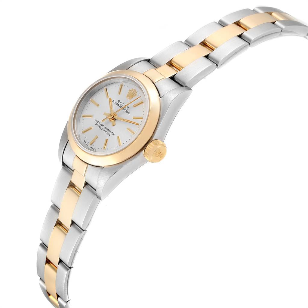 The image shows a Rolex Oyster Perpetual 67183 Women's Steel and Gold (two tone) Silver Dial 67183 Women's Steel and Gold (two tone) Silver Dial watch at a slight angle, highlighting its face, bezel, crown, and two-tone bracelet.