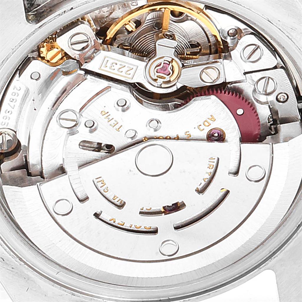 This close-up image shows the intricate internal movement parts of a Rolex Oyster Perpetual 176200 Women
s Stainless Steel Black Dial 176200 Women
s Stainless Steel Black Dial watch.