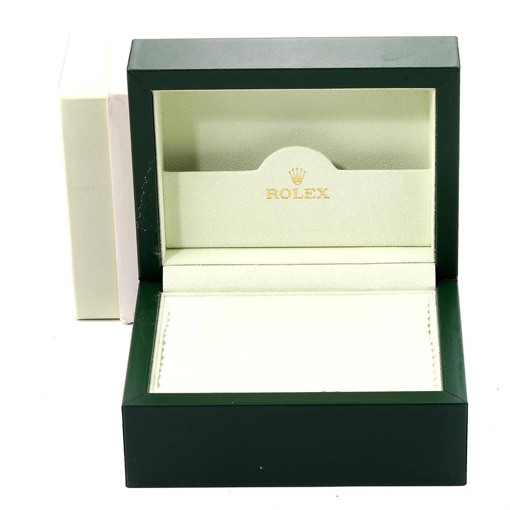 The image shows an empty open Rolex watch box for the Oyster Perpetual model, from a front angle.