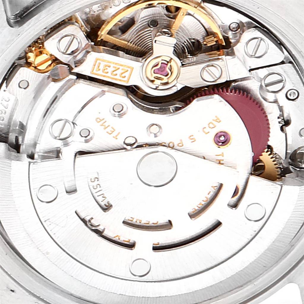 This close-up image shows the internal movement mechanism of the Rolex Oyster Perpetual 176200 Women
s Stainless Steel Black Dial 176200 Women
s Stainless Steel Black Dial watch.