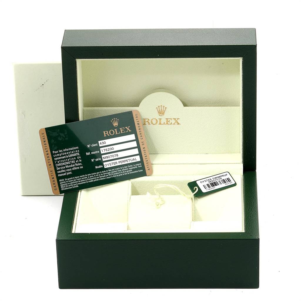 This image displays an open Rolex Oyster Perpetual 176200 Women
s Stainless Steel Black Dial 176200 Women
s Stainless Steel Black Dial watch box along with its Best Quality
ity and model information card.