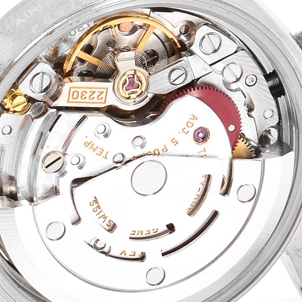 This image shows the detailed internal mechanical movement of a Rolex Oyster Perpetual 76080 Women's Stainless Steel Pink Dial 76080 Women's Stainless Steel Pink Dial watch at a close-up angle.