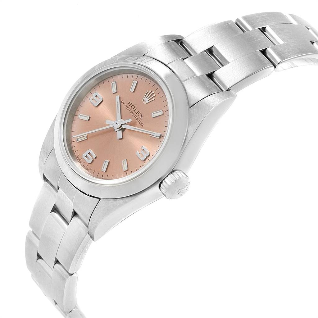 This image shows a Rolex Oyster Perpetual 76080 Women's Stainless Steel Pink Dial 76080 Women's Stainless Steel Pink Dial watch at a slight angle, highlighting the dial, crown, and stainless steel bracelet.