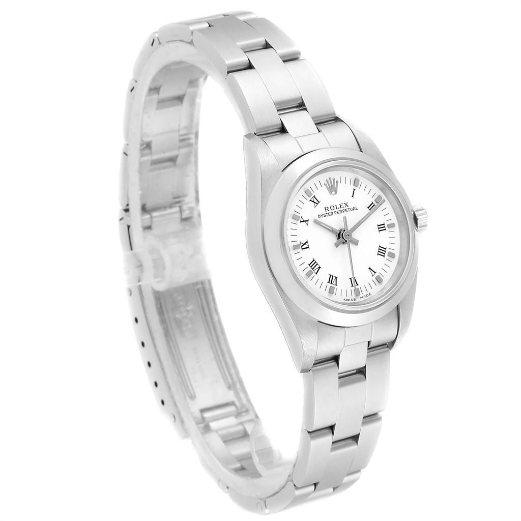 This Rolex Oyster Perpetual 76080 Women
s Stainless Steel White Dial 76080 Women
s Stainless Steel White Dial watch is shown from a three-quarter angle displaying the face, case, and partial bracelet.
