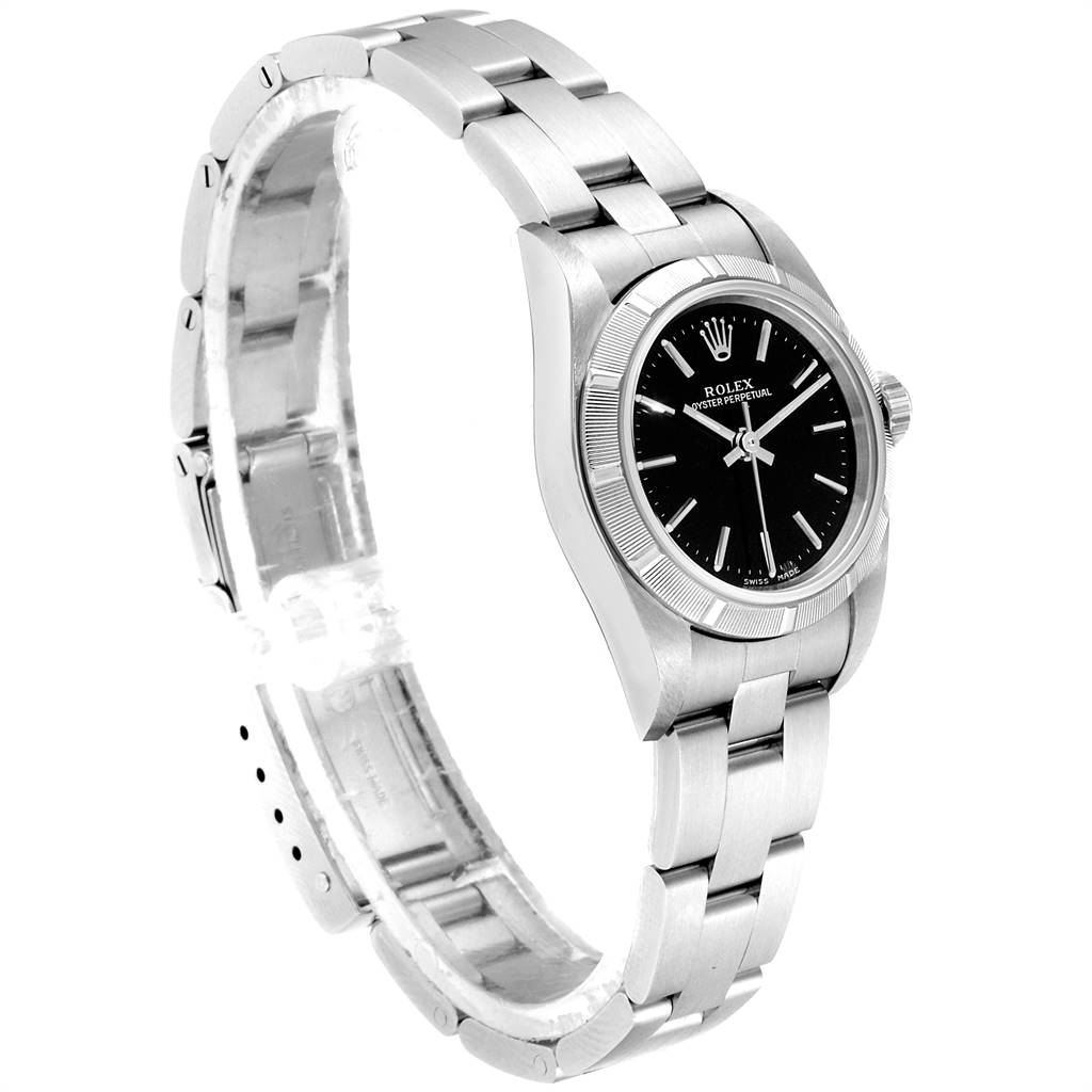 The image shows a side-angle view of a Rolex Oyster Perpetual 76030 Women's Stainless Steel Black Dial 76030 Women's Stainless Steel Black Dial watch highlighting its black dial, bezel, and metal bracelet.