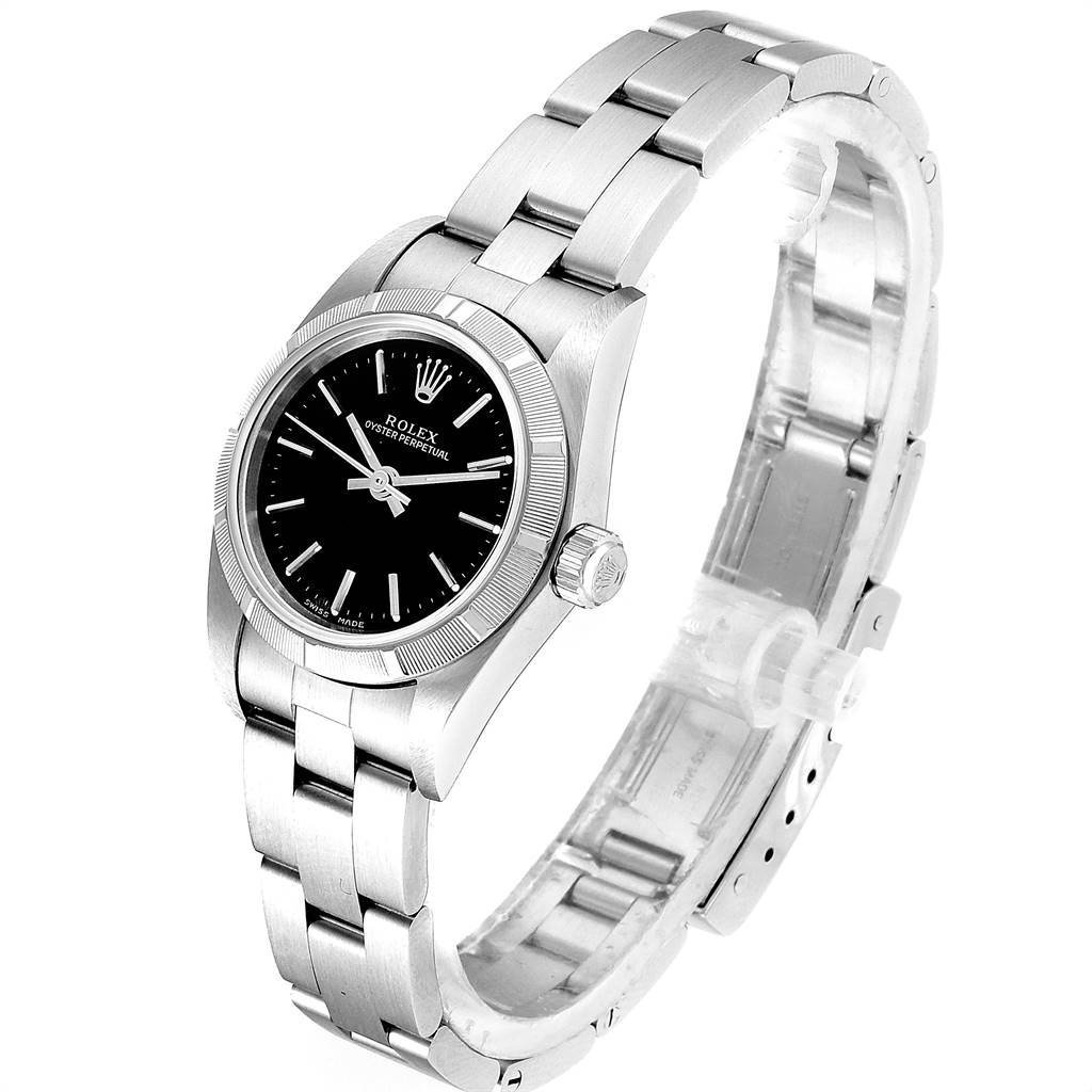 The image shows a Rolex Oyster Perpetual 76030 Women's Stainless Steel Black Dial 76030 Women's Stainless Steel Black Dial watch from a three-quarter angle, displaying the face, bezel, and bracelet.