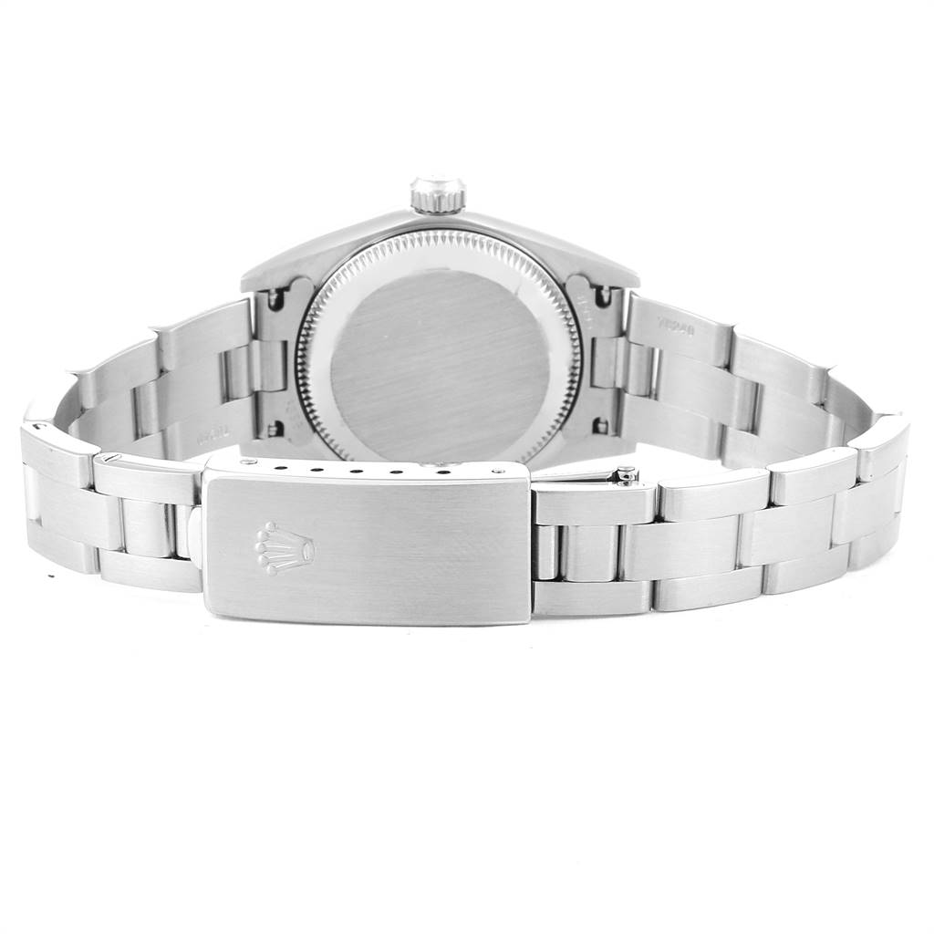 The image shows the back view of a Rolex Oyster Perpetual 76030 Women's Stainless Steel Black Dial 76030 Women's Stainless Steel Black Dial watch, highlighting the case back and metal bracelet with the clasp.