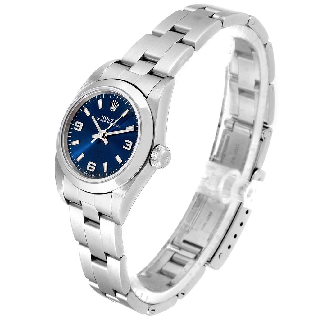 This image shows the Rolex Oyster Perpetual 76080 Women
s Stainless Steel Blue Dial 76080 Women
s Stainless Steel Blue Dial watch from a three-quarter view, capturing the full face, bezel, crown, and bracelet.