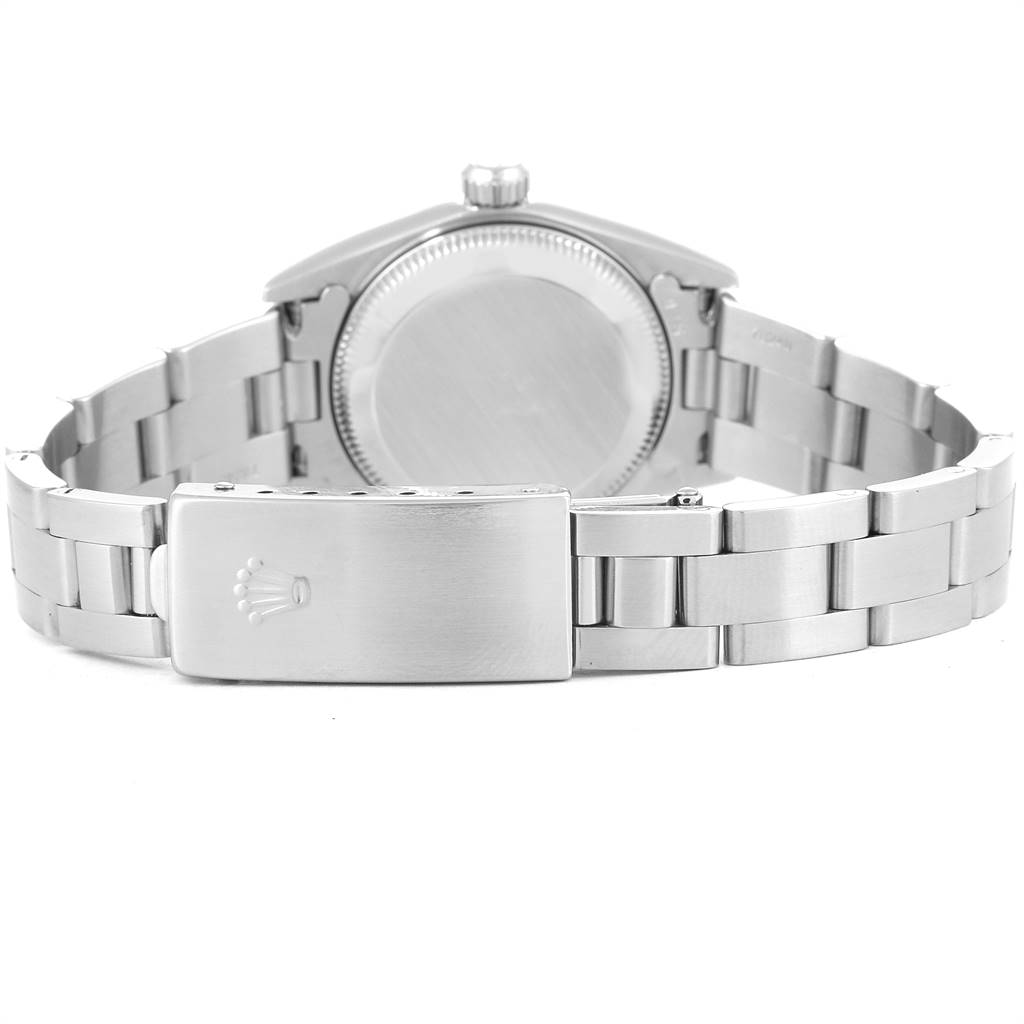 The image shows the back case and clasp of a Rolex Oyster Perpetual 76080 Women
s Stainless Steel Blue Dial 76080 Women
s Stainless Steel Blue Dial watch from behind.