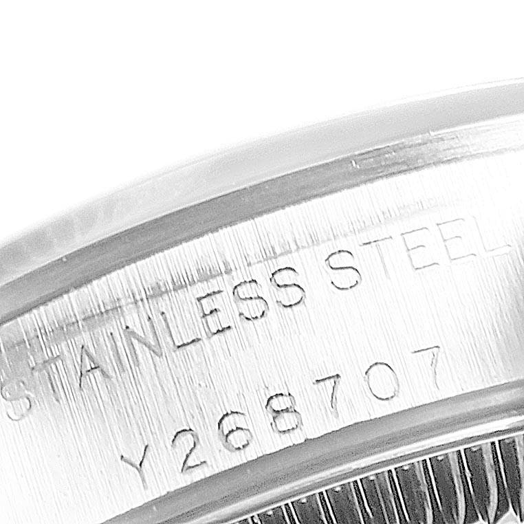 The image shows a close-up view of the stainless steel case back with model engraving of the Rolex Oyster Perpetual 76080 Women's Stainless Steel Pink Dial 76080 Women's Stainless Steel Pink Dial watch.