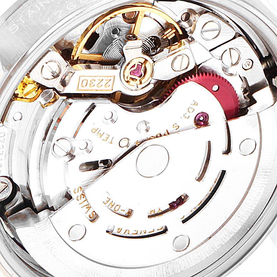 This image shows a close-up and detailed view of the movement mechanism inside a Rolex Oyster Perpetual 76080 Women's Stainless Steel Pink Dial 76080 Women's Stainless Steel Pink Dial watch.