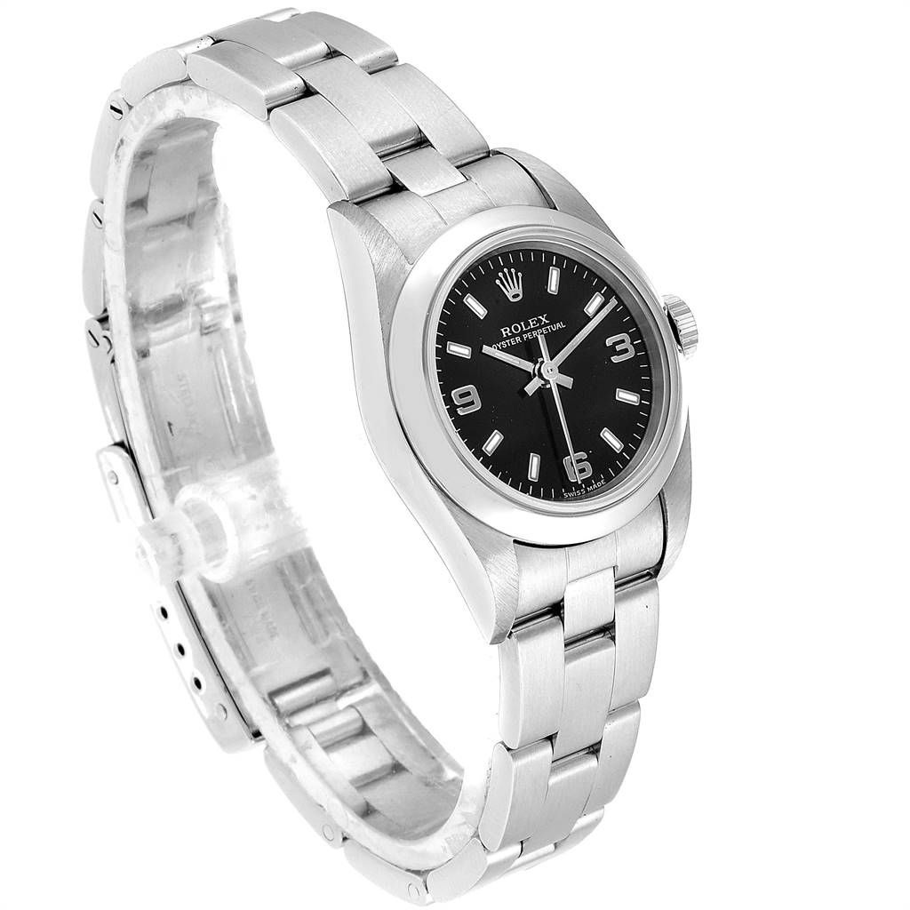 The Rolex Oyster Perpetual 76080 Women's Stainless Steel Black Dial 76080 Women's Stainless Steel Black Dial watch is shown from an angle highlighting its face, bezel, crown, and metal bracelet.