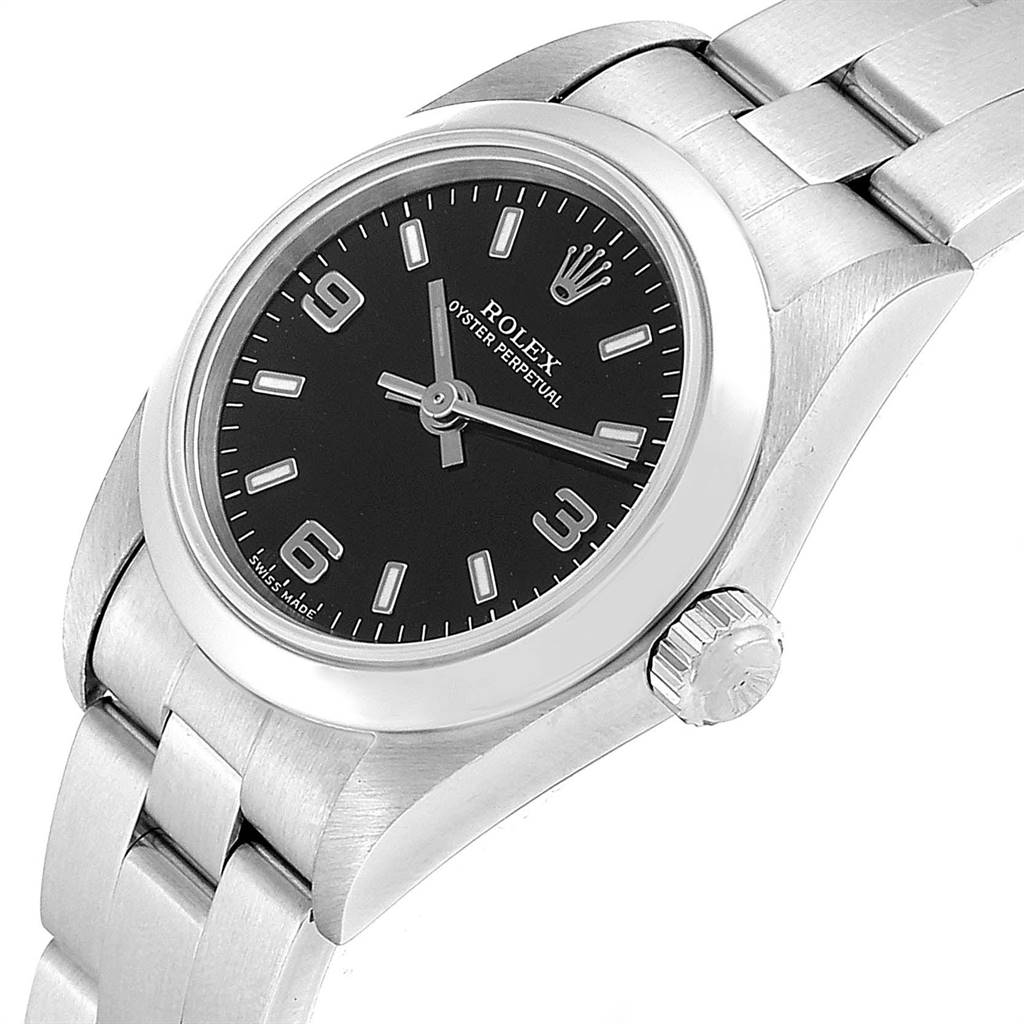 The image shows a Rolex Oyster Perpetual 76080 Women's Stainless Steel Black Dial 76080 Women's Stainless Steel Black Dial watch from an angled side view, highlighting the black dial, crown, and stainless-steel bracelet.