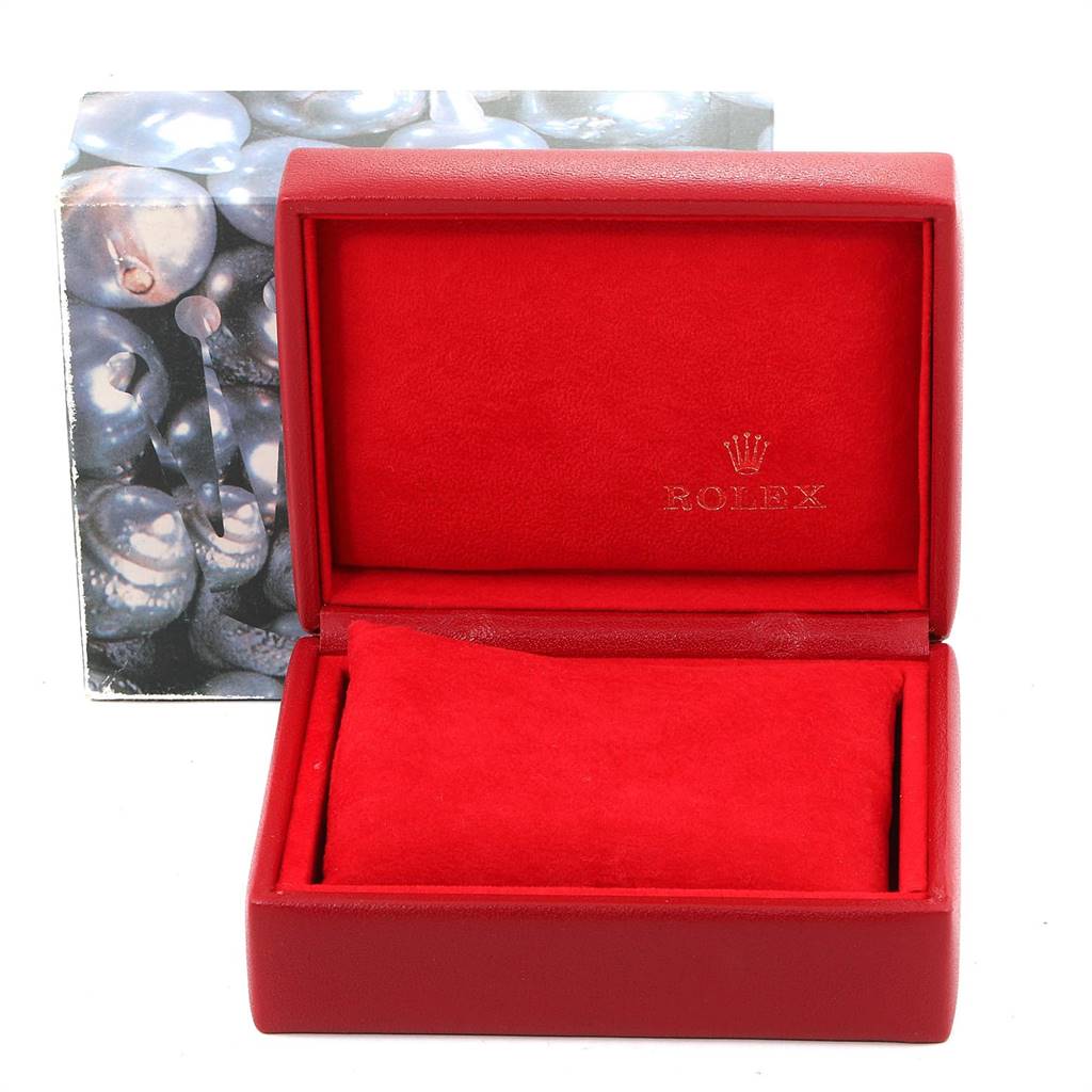 The image shows an open red box for a Rolex Oyster Perpetual 76080 Women's Stainless Steel Black Dial 76080 Women's Stainless Steel Black Dial watch, with the brand logo and name visible inside.