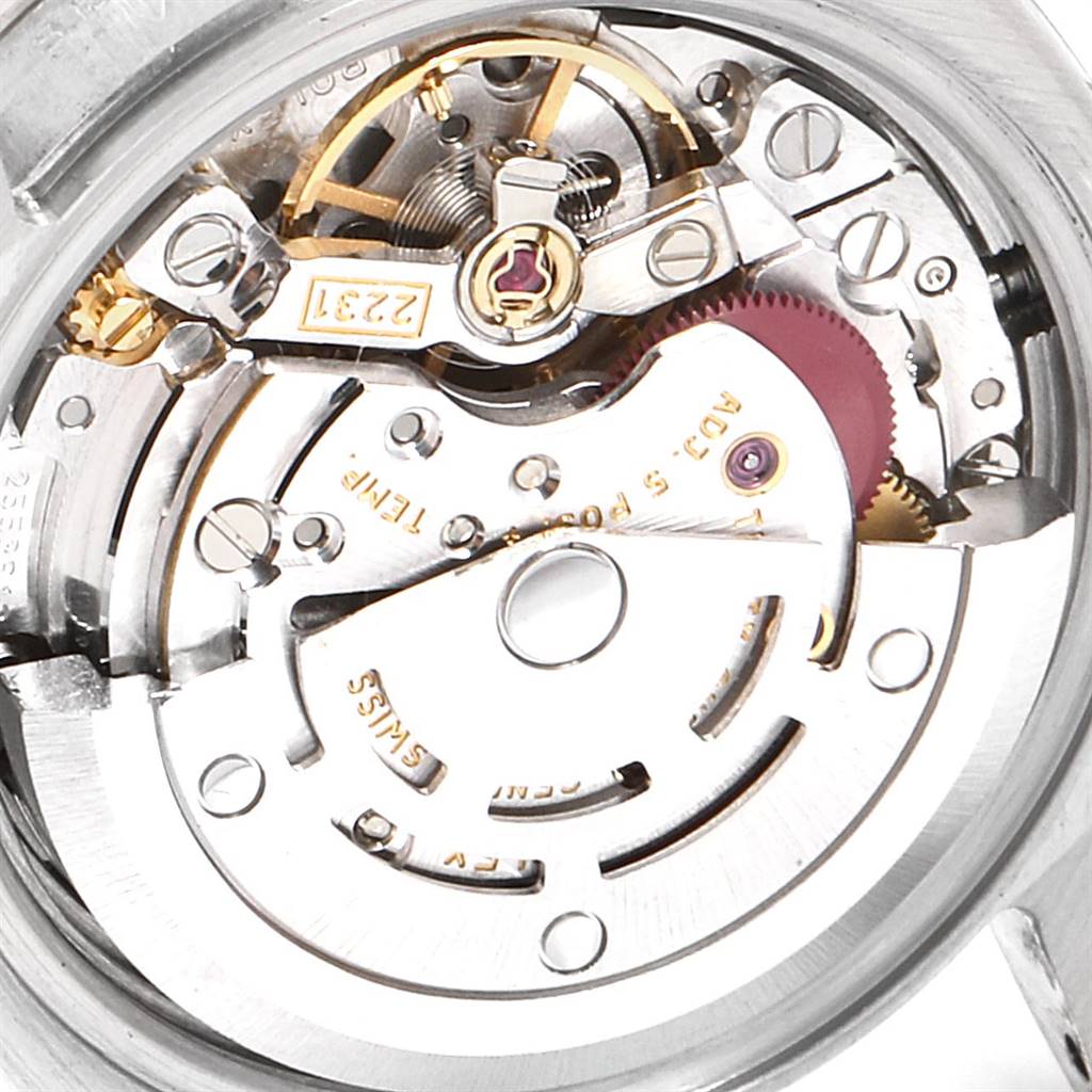 This image shows a close-up of the internal mechanics of the Oyster Perpetual model by Rolex, including the movement components.