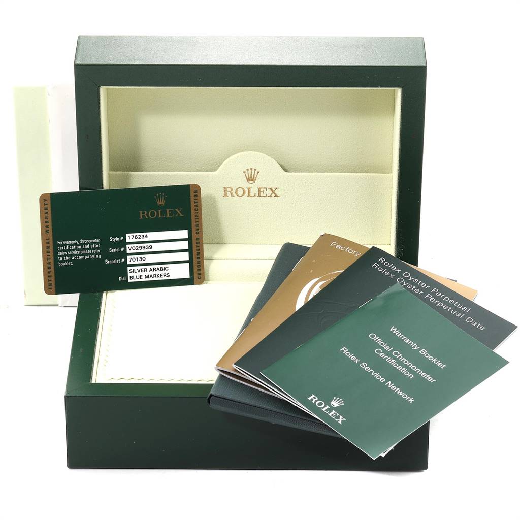 This image shows the open box of a Rolex Oyster Perpetual 176234 Women's Stainless Steel Silver Dial 176234 Women's Stainless Steel Silver Dial, along with warranty booklets and a certification card.