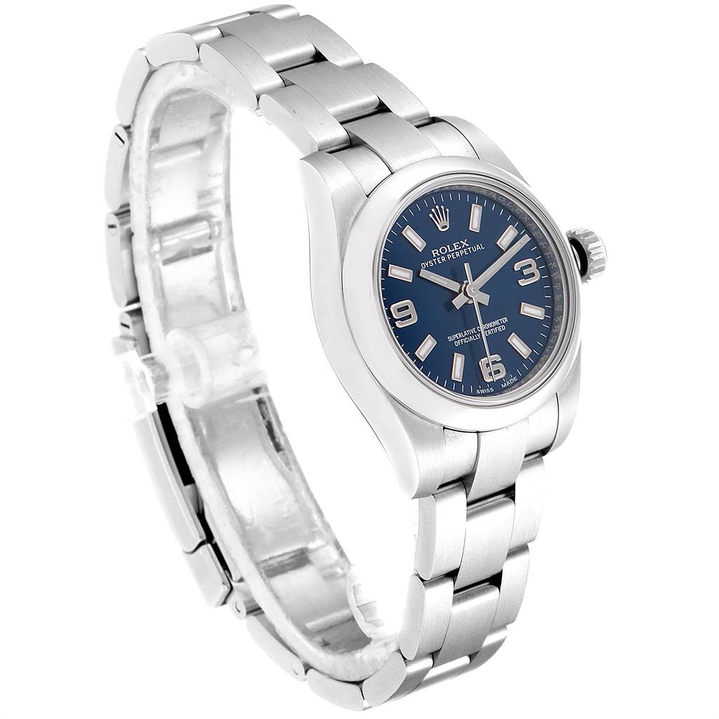 The Rolex Oyster Perpetual 176200 Women's Stainless Steel Blue Dial 176200 Women's Stainless Steel Blue Dial watch is shown in a slight angle displaying its blue dial, bezel, crown, and bracelet.