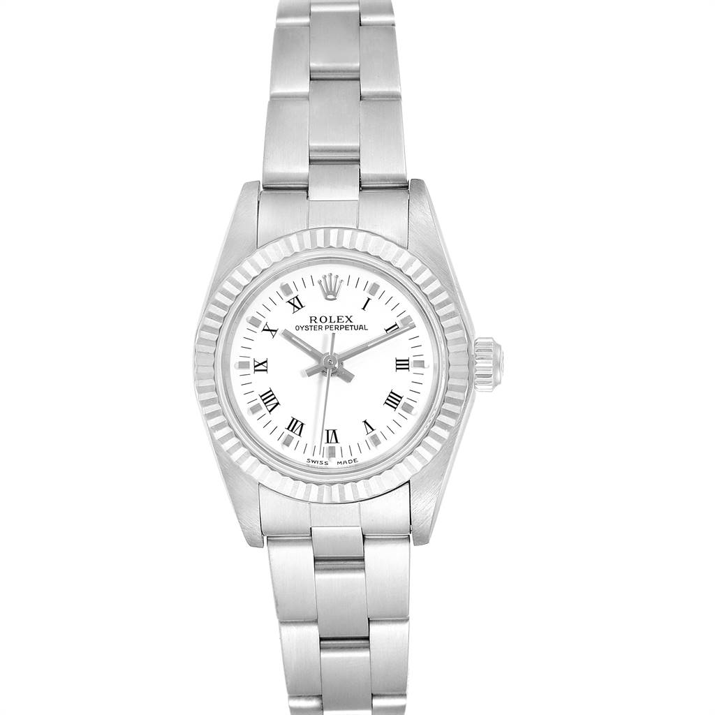 The Rolex Oyster Perpetual 76094 Women
s Stainless Steel White Dial 76094 Women
s Stainless Steel White Dial watch is shown from a top-down angle, displaying the dial, bezel, case, and bracelet.