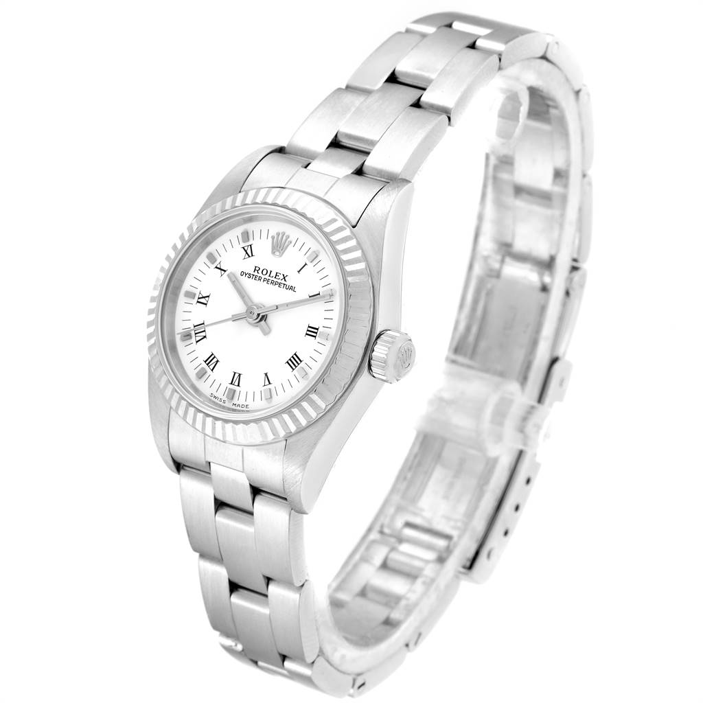 This image shows the Rolex Oyster Perpetual 76094 Women
s Stainless Steel White Dial 76094 Women
s Stainless Steel White Dial watch at an angle highlighting the face, bracelet, and clasp.