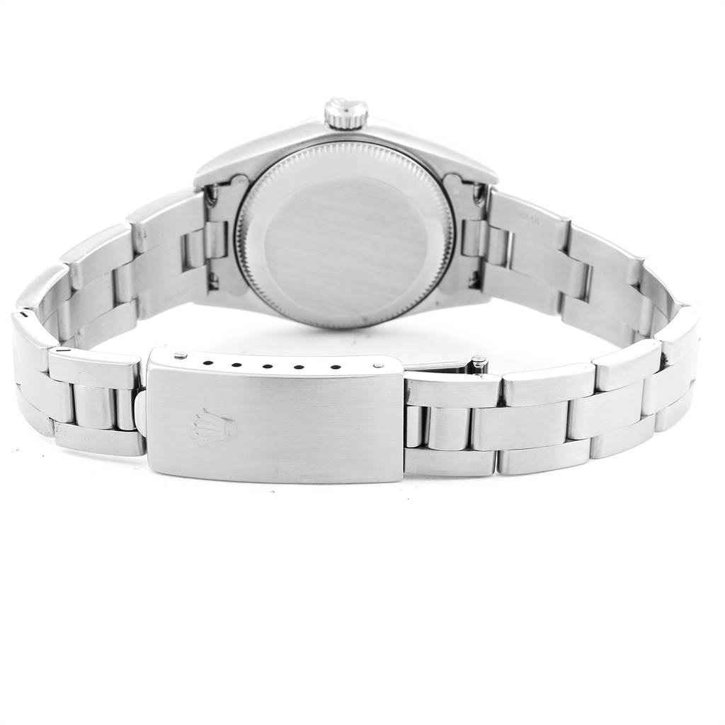 The image shows the back view of the Rolex Oyster Perpetual 76094 Women
s Stainless Steel White Dial 76094 Women
s Stainless Steel White Dial watch, featuring the case back, crown, and metal bracelet with clasp.