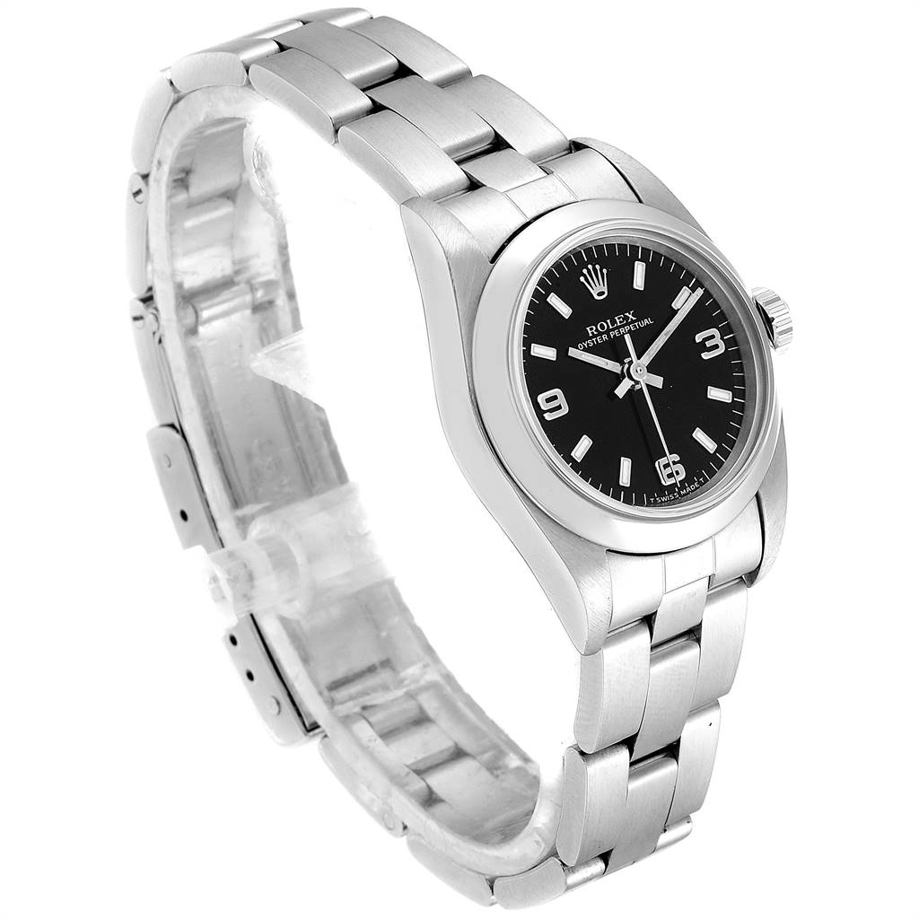 The Rolex Oyster Perpetual 76080 Women's Stainless Steel Black Dial 76080 Women's Stainless Steel Black Dial watch is shown at a three-quarter angle, highlighting the bracelet, black dial, and case.