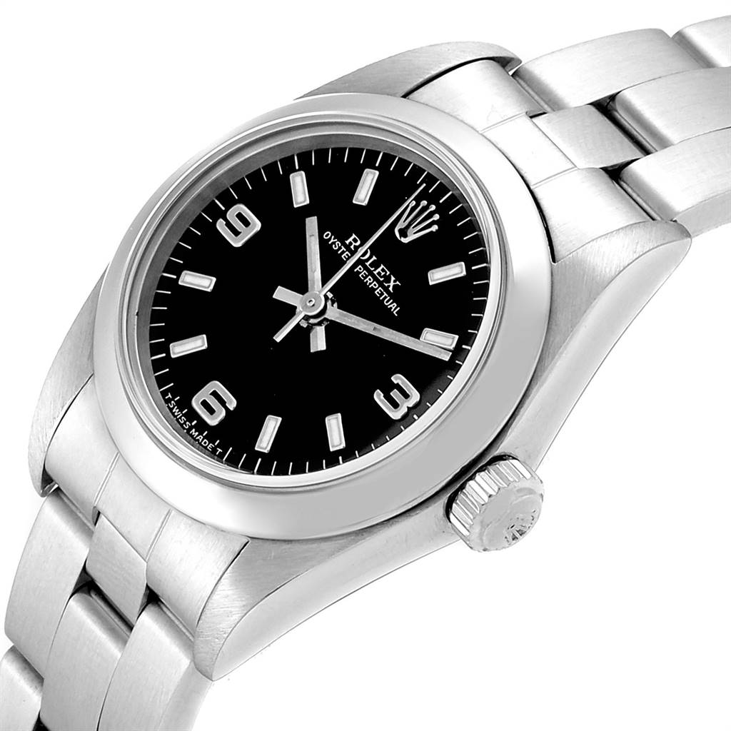 This image shows a close-up of the Rolex Oyster Perpetual 76080 Women's Stainless Steel Black Dial 76080 Women's Stainless Steel Black Dial watch at an oblique angle, highlighting the dial, case, crown, and part of the bracelet.